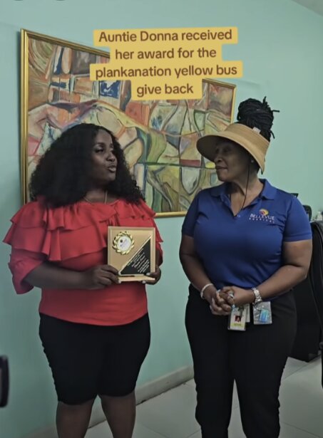 Donna Gowe receiving the Plankanation Yellow Bus giveback award
